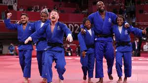 Will a mixed-gender team event be added to the Olympics in 2026?